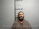 Mugshot of Tommy Robinson booked in Benton County, Arkansas on July 9, 2026