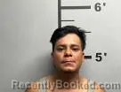 Mugshot of Christian Crespin-Hernandez booked in Benton County, Arkansas on July 12, 2026