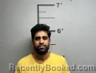 Mugshot of Sricharan Surapaneni booked in Benton County, Arkansas on July 12, 2026