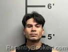 Mugshot of Romario Tafolla booked in Benton County, Arkansas on July 12, 2026