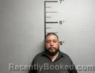 Mugshot of Gustavo Jr Mendez-Garcia booked in Benton County, Arkansas on July 13, 2026