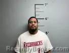 Mugshot of Menson Harris booked in Benton County, Arkansas on July 14, 2026