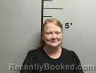 Mugshot of Kelly Knollman booked in Benton County, Arkansas on July 16, 2026