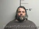 Mugshot of Dustn Wells booked in Benton County, Arkansas on July 21, 2026