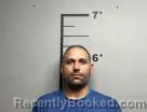 Mugshot of Sergio Urquidi booked in Benton County, Arkansas on August 7, 2026