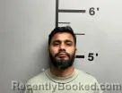 Mugshot of Rupeshkumar Patel booked in Benton County, Arkansas on August 8, 2026