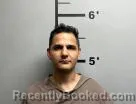 Mugshot of Alek Guzman booked in Benton County, Arkansas on August 20, 2026