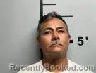 Mugshot of Alejandro Espinoza-Chavez booked in Benton County, Arkansas on August 21, 2026