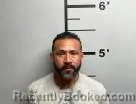 Mugshot of Michael Jr Flores booked in Benton County, Arkansas on August 25, 2026