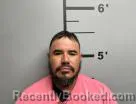 Mugshot of Carlos Ardon-Flores booked in Benton County, Arkansas on August 31, 2026