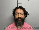 Mugshot of Ubaldo Acevedo Trevizo booked in Benton County, Arkansas on September 11, 2026