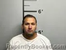Mugshot of Humberto Albarron-Garcia booked in Benton County, Arkansas on October 14, 2026