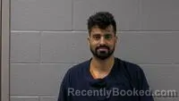 Mugshot of ABHISHEK SHARMA booked in Carroll County, Arkansas on April 25, 2026