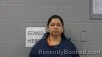 Mugshot of KIMBERLY G BARRIOS-CIFUENTES booked in Carroll County, Arkansas on May 3, 2026