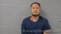 Mugshot of KA P HTOO booked in Carroll County, Arkansas on June 1, 2026