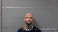 Mugshot of SEAN M RABONE booked in Carroll County, Arkansas on June 18, 2026