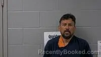 Mugshot of JUAN J LOPEZ-CORADO booked in Carroll County, Arkansas on July 2, 2026