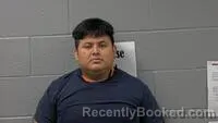 Mugshot of BYRON E MARTINEZ-LOPEZ booked in Carroll County, Arkansas on July 9, 2026