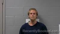 Mugshot of JONATHAN H REYNOLDS booked in Carroll County, Arkansas on August 3, 2026