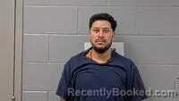 Mugshot of Enrique Nino-Flores booked in Carroll County, Arkansas on August 19, 2026