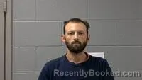 Mugshot of Joshua P Olson booked in Carroll County, Arkansas on September 4, 2026