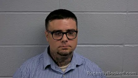 Mugshot of JONATHAN W SIMMONS