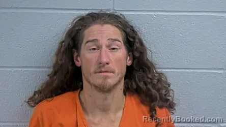 Mugshot of LOGAN M THOMAS
