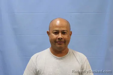 Mugshot of Sisawat Sie Singmuongthong booked in Crawford County, Arkansas on August 14, 2026