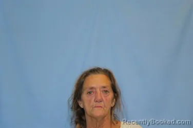 Mugshot of CATHERINE OSZANIEC booked in Crawford County, Arkansas on July 12, 2026