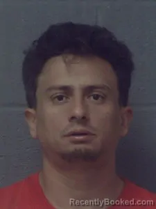 Mugshot of Carlos Roberto Menjivar-Palma booked in Crittenden County, Arkansas on May 14, 2026