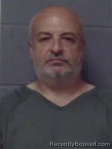 Mugshot of Huseyin Hassan booked in Crittenden County, Arkansas on June 23, 2026
