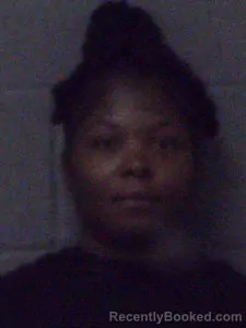 Mugshot of Denishia Marie Host booked in Crittenden County, Arkansas on October 13, 2026