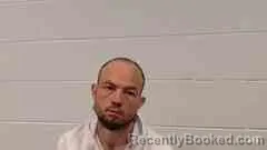 Mugshot of Aaron Holland booked in Cross County, Arkansas on August 31, 2026