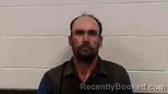 Mugshot of John Burchfield booked in Cross County, Arkansas on October 9, 2026
