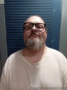 Mugshot of Adam Johnson