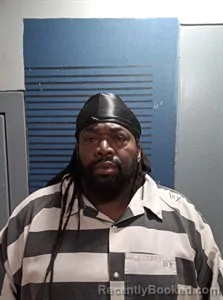 Mugshot of Ray Chester Broughton