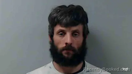 Mugshot of JUSTIN THARP