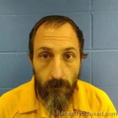 Mugshot of DUSTIN BARKER