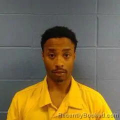 Mugshot of TACOIUS MOORE