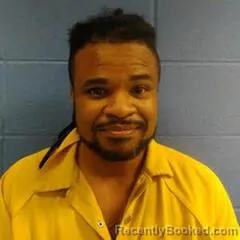 Mugshot of CYRUS REDMON