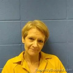 Mugshot of JULIE DALE booked in Faulkner County, Arkansas on March 12, 2026