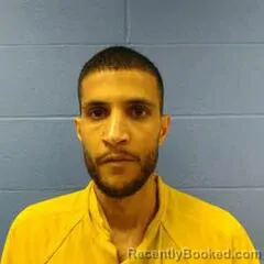 Mugshot of ABDALLAH KHMOUS booked in Faulkner County, Arkansas on March 13, 2026