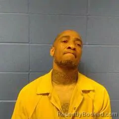 Mugshot of MALIK CARTER booked in Faulkner County, Arkansas on March 24, 2026