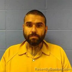 Mugshot of JUSTIN RAMOS booked in Faulkner County, Arkansas on March 27, 2026