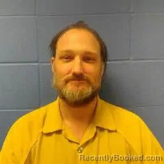 Mugshot of JUSTIN RISINGER booked in Faulkner County, Arkansas on April 1, 2026