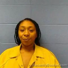 Mugshot of MARA FLOOD booked in Faulkner County, Arkansas on April 7, 2026