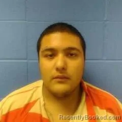 Mugshot of CARLOS OLIVAS booked in Faulkner County, Arkansas on June 27, 2026