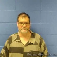 Mugshot of BRYAN SMUCK booked in Faulkner County, Arkansas on May 19, 2026