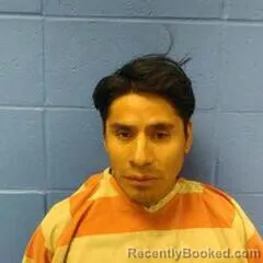 Mugshot of VICTOR TOJIN booked in Faulkner County, Arkansas on May 23, 2026