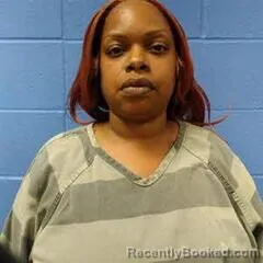 Mugshot of LATOSHA WHITE booked in Faulkner County, Arkansas on July 6, 2026